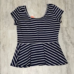 Peplum shirt with pink bow in the back